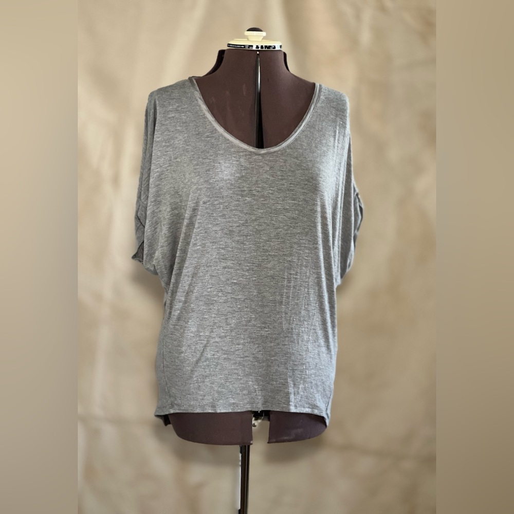 White House Black Market Grey Jetsetter Swing Tee with sleeve detail.